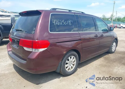 2010 Honda Odyssey Ex-L z USA, uszkodzony, nr VIN 5FNRL3H69AB058555